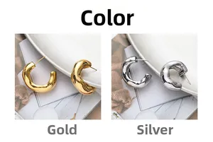 Detailed comparison of thick C-shape hoop earrings in polished gold and silver finishes