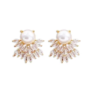 Elegant gold earrings with round pearls and marquise-cut cubic zirconia fan design