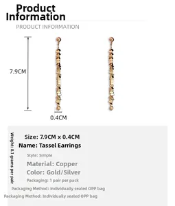 Macro shot of gold-plated chain tassel earrings with precise length of 7.9cm measurements