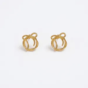 Elegant gold bow earrings with geometric hollow wire design for stylish women
