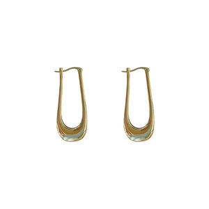 Minimalist gold U-shaped earrings with a polished mirror finish for a modern luxury look