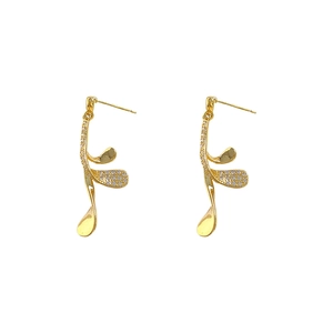 24K gold plated leaf earrings featuring organic wavy lines and shimmering white zircons