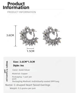 Detailed view showing dimensions and weight of C-shaped heart tassel earrings in silver