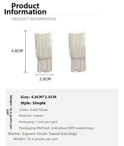 Detailed view of gold and silver square chain tassel earrings with size dimensions