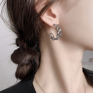 Modern silver C-shaped chunky chain hoop earrings with a polished metallic finish