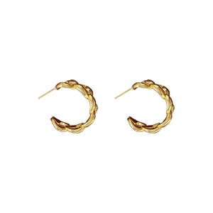 Polished gold-plated C-shaped chunky twisted hoop earrings with a metallic retro design
