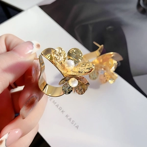 Artistic gold flower hoop earrings with hammered texture and white pearls for women