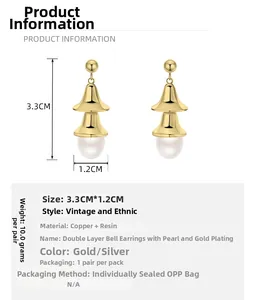 Detail view of gold-plated bell earrings with pearls, size 3.3x1.2cm, vintage ethnic style