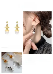 Detail of Chinese style bell pearl earrings showing gold and silver finish options