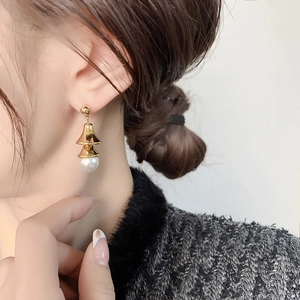 New Chinese style gold-plated bell earrings with pearls shown on model