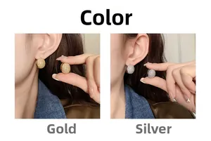 Detailed comparison of gold and silver dome earrings set with sparkling zircon crystals