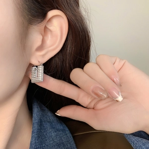 Luxurious 24K gold plated geometric square earrings with micro-pave crystals on model