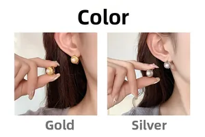 Detailed comparison of gold and silver circle earrings with white pearls on model