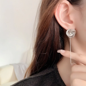 24K gold plated rose stud earrings with long chain tassels and silver finish on a model