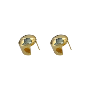 Polished gold plated dome C-shape stud earrings with a minimalist geometric metal finish