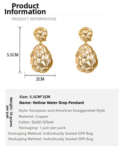 Detailed view of teardrop hollow tassel earrings in gold plated copper with 5.5cm size
