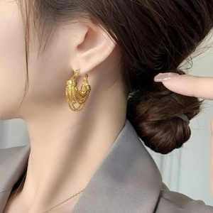 18K gold plated brass U-shaped chain earrings with elegant fringe tassels on model