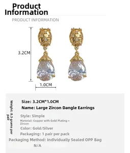 Detailed view of teardrop zircon earrings with measurements 3.2cm by 1.0cm