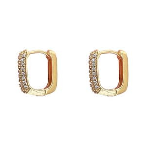 Elegant U-shaped gold plated earrings with sparkling zircon stones in a sleek modern design