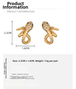 Detailed view of snake earrings measuring 2.2cm by 1.6cm with gold plating and cubic zirconia