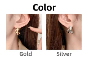 Detailed comparison of snake stud earrings in 18K gold and silver finishes with zircon