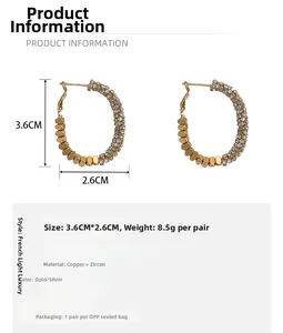 Fiche technique des boucles d'oreilles dorées zircon, taille 3,6cm et poids 8,5g