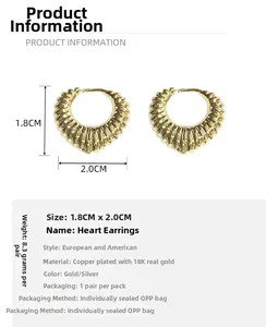 Detailed size and weight specifications for gold heart earrings with ridged texture