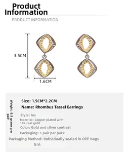 Detail view of two-tone geometric diamond earrings with 18K gold plated copper texture