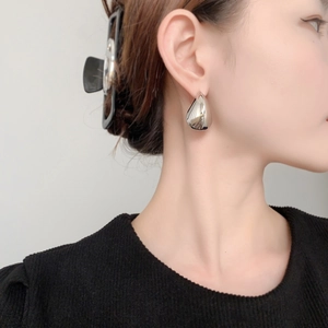 Polished silver teardrop earrings for women in a minimalist water drop design