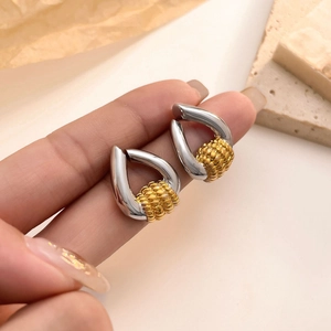 French style gold and silver two-tone teardrop earrings with textured metallic bead details