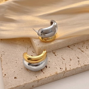 Minimalist C-shaped two-tone gold and silver chunky hoop earrings for women