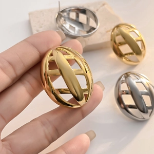 Modern oval cage hollow metal earrings in gold and silver finish for a minimalist chic look