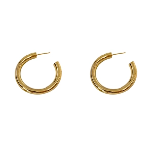 Minimalist chunky golden brass hoop earrings with mirror polished finish and C-shape design