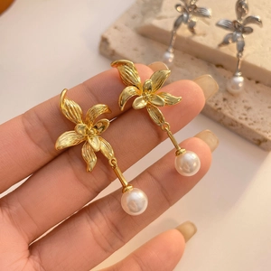 French style orchid flower earrings with gold metal petals and hanging round white pearls