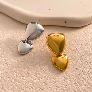 Polished 18K gold and silver waterdrop earrings with a minimalist mirror finish design