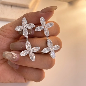 Luxurious silver double clover drop earrings with marquise cut cubic zirconia stones