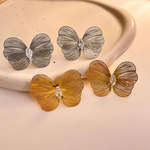 Artistic vintage hollow butterfly earrings with brushed metal texture and zircon stone