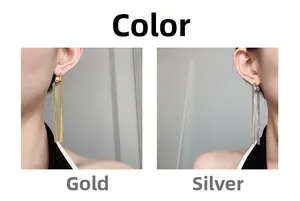 Detailed comparison of long chain tassel earrings in 18K gold and silver finishes