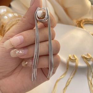 U-shaped long chain tassel earrings in 18k gold and silver plated finish