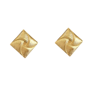 Minimalist gold plated rhombus stud earrings with a spiral windmill texture on white background