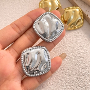 Chic silver square stud earrings with textured molten metal finish and beaded border
