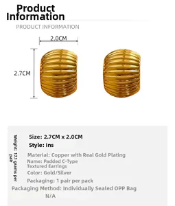 Macro view of gold plated C-shaped textured earrings with dimension and weight details