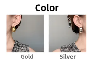 Boucles d'oreilles gouttes polies en or et argent portées sur l'oreille