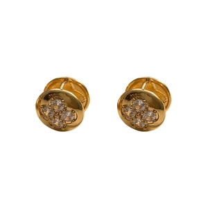 Detailed view of gold plated flower hoop earrings with sparkling cubic zirconia clusters