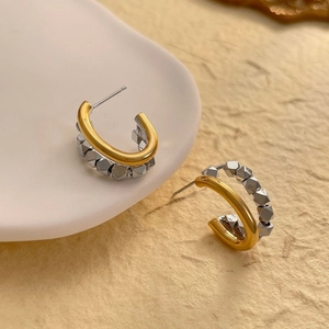 Modern two-tone C-shape hoop earrings with geometric metallic beads in gold and silver