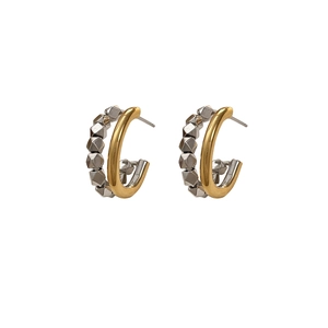 Modern double-layer C-shaped earrings with geometric silver studs and gold inner rings