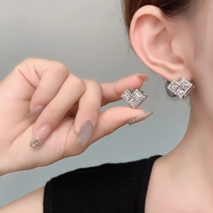 Detailed view of silver square zircon earrings with premium minimalist geometric design