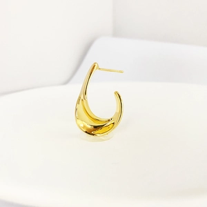 Minimalist gold-plated C-shaped earrings with a polished mirror finish and sleek design