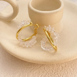 Elegant gold hoop earrings with sparkling cubic zirconia crystals for women
