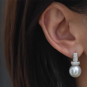 Lustrous white pearl drop earrings with micro-pave zircon on 18K gold plated metal